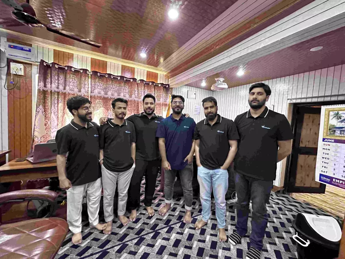 The Marketing Lad team in matching T-shirts at the office